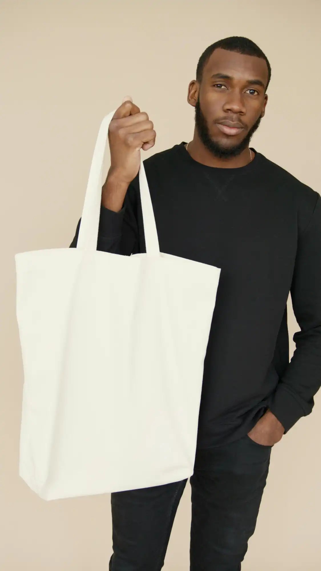 Sac fourre-tout blanc en toile.